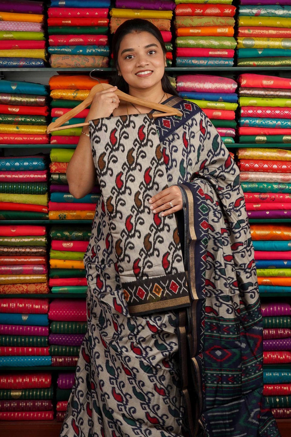 Maheswari Silk Ikkath Design Cream And Black Saree