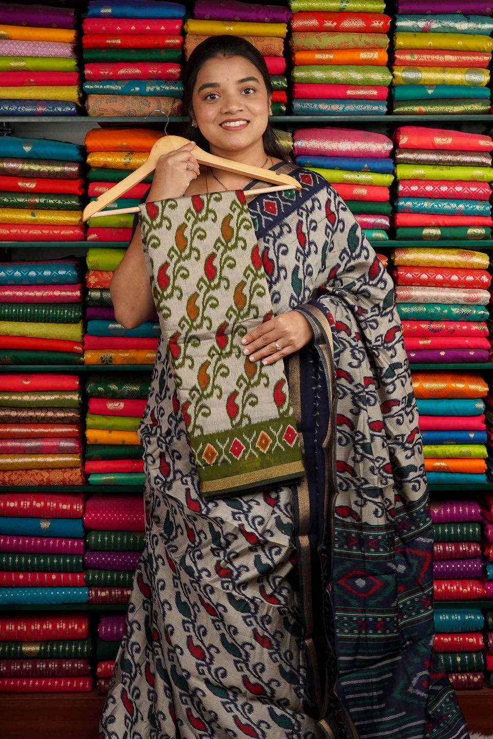 Maheswari Silk Ikkath Design Cream And Mehandi Green Saree