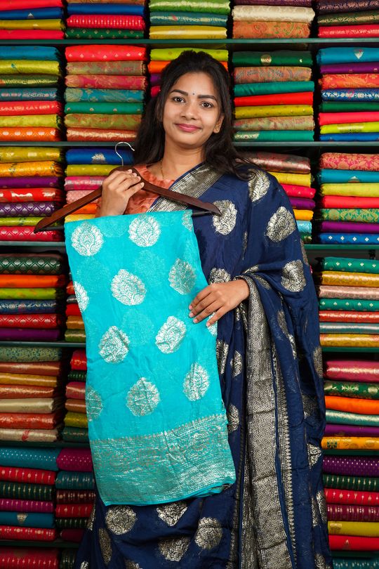 Viscose Georgette Butti Sky Blue And Navy Blue Saree