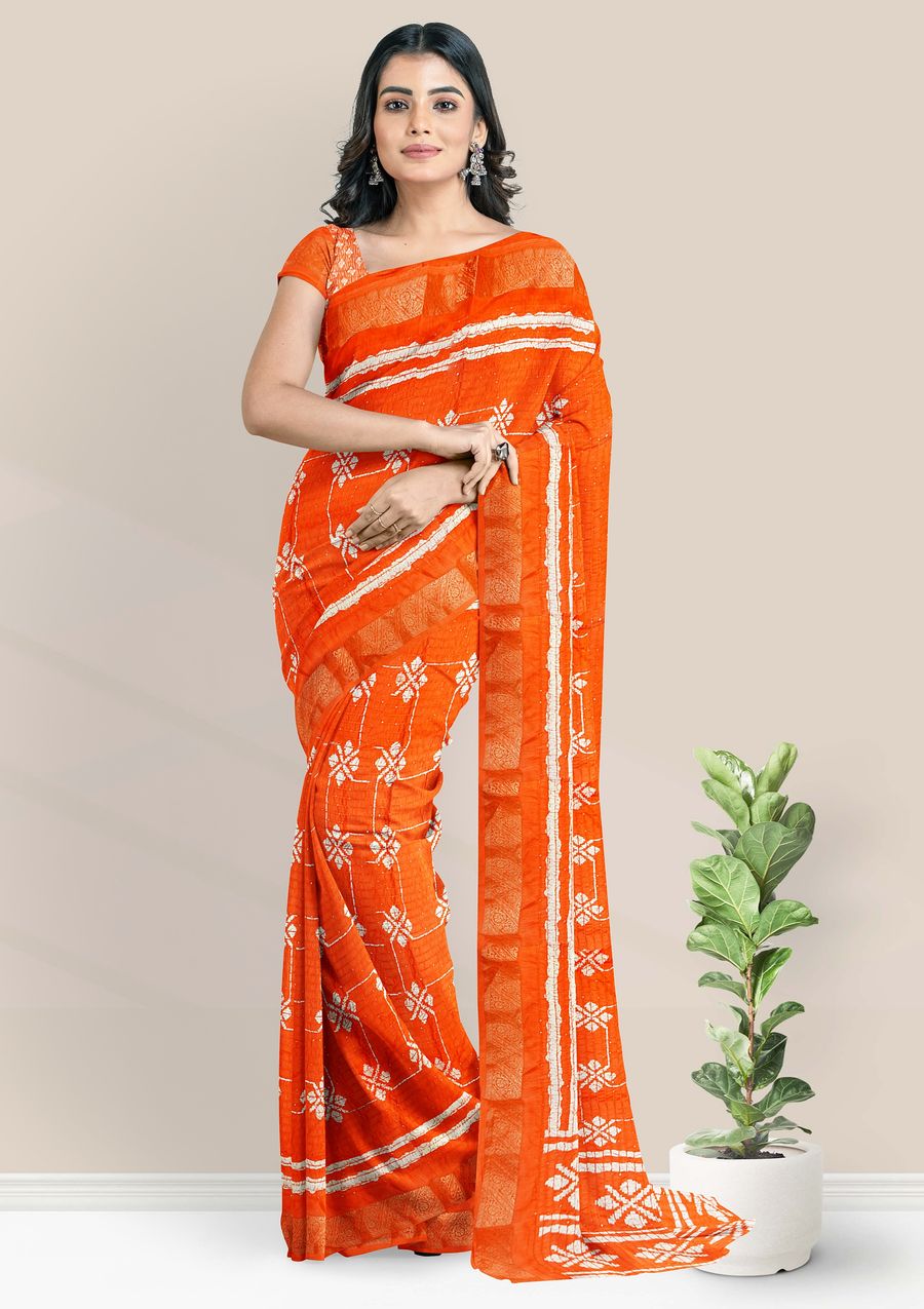 Vishal Prints Dark Orange Georgette Saree With Foil Print And Zari Bor