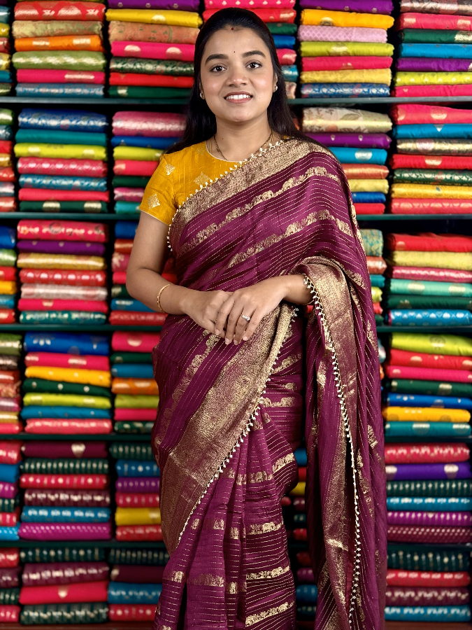 Dola Crepe Lines Pearls Beads Work Wine And Yellow Saree