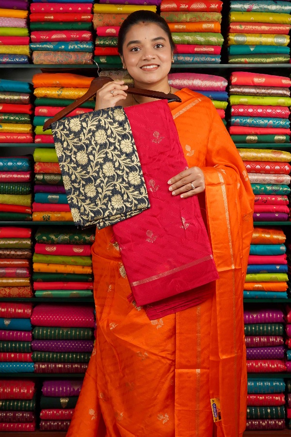 Crepe Silk Emboose Weaving With Zari Butti Pink And Blue Saree