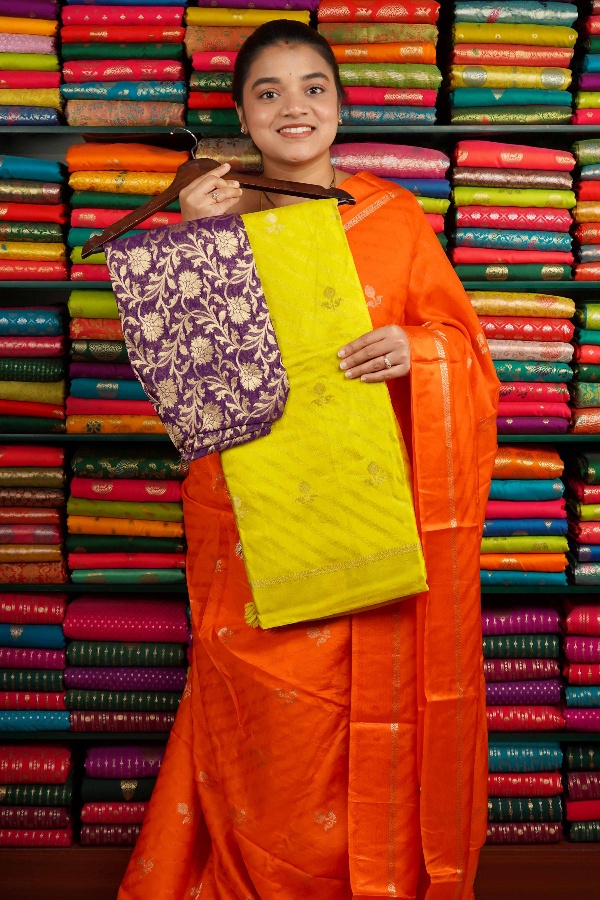 Crepe Silk Emboose Weaving With Zari Butti Yellow And Purple Saree