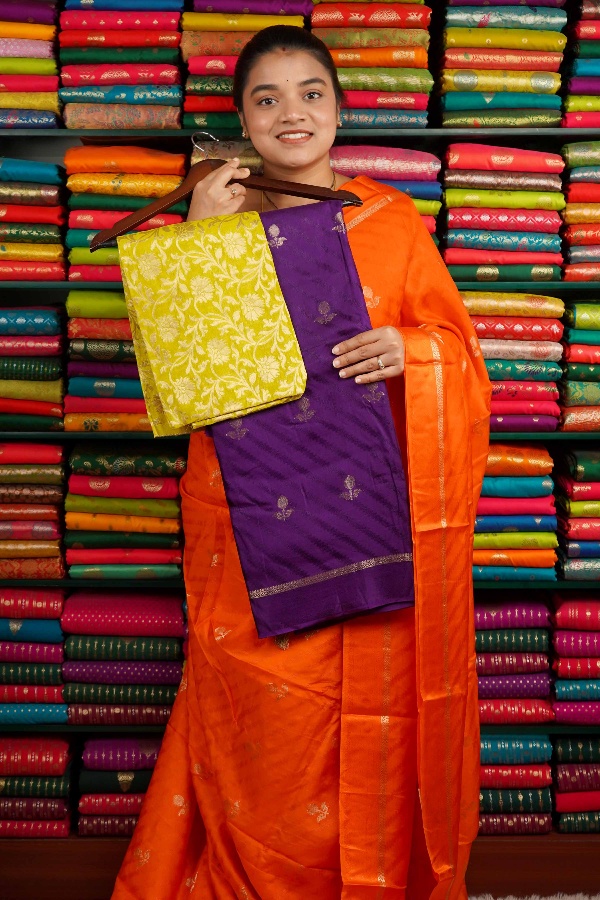 Crepe Silk Emboose Weaving With Zari Butti Purple And Yellow Saree