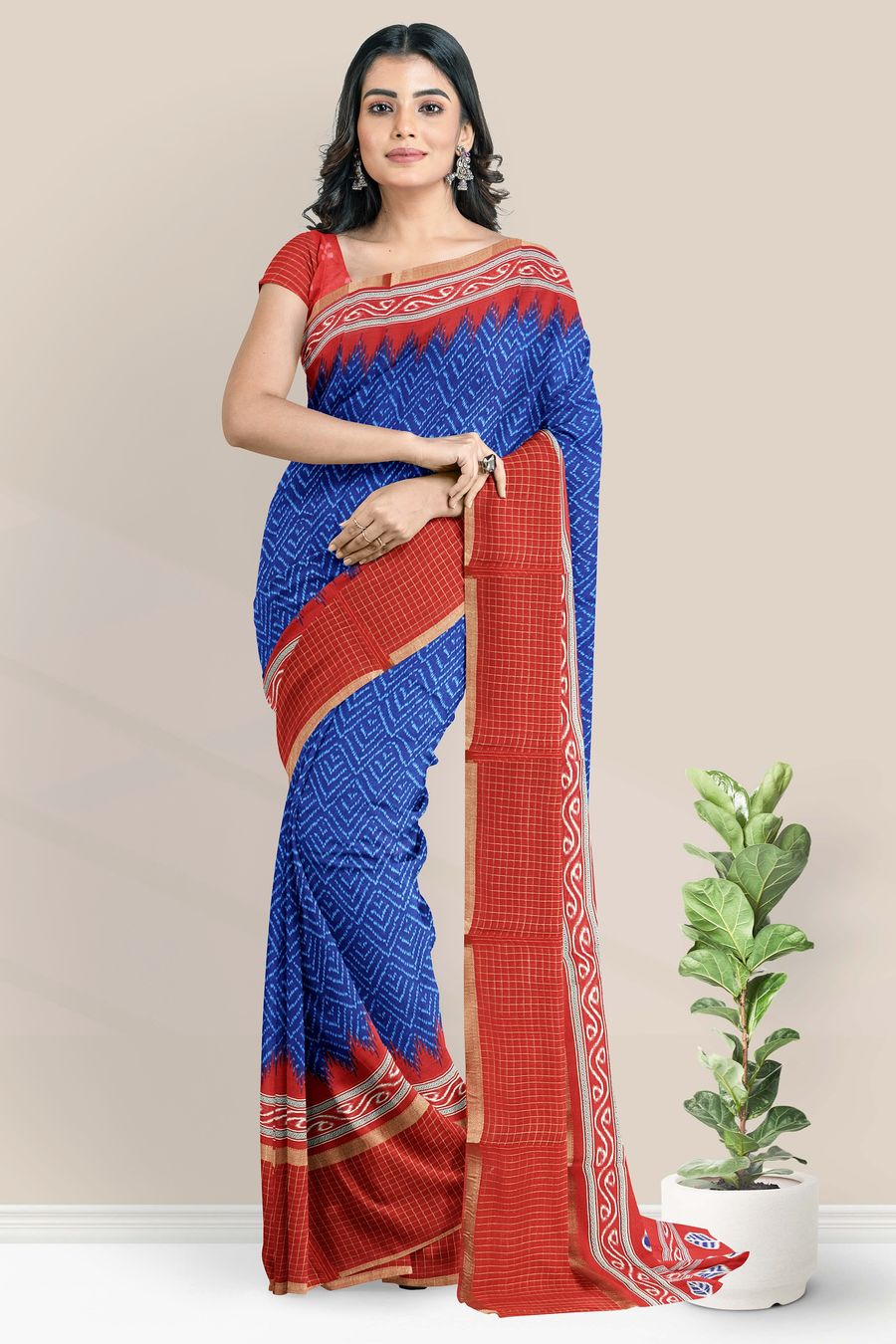 Muslin Georgette Ikkath Print Blue With Red Saree