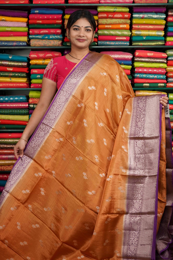 Soft Tissue Flower Butti With Zari Border Orange And Lavendar Saree