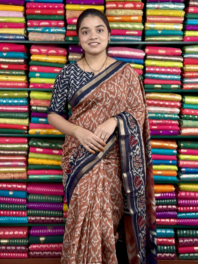 Maheswari Silk Ikkath Design Brown And Navy Blue Saree